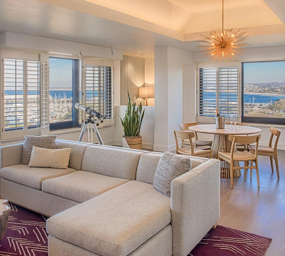 Portola Executive Suite — living area with plush seating and dining space