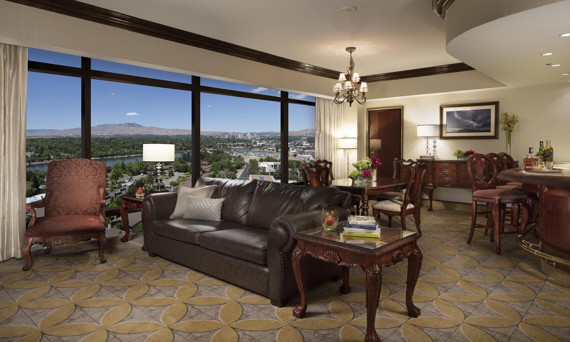 Peppermill Penthouse Suite at Peppermill Resort Spa Casino — bedroom with premium bedding