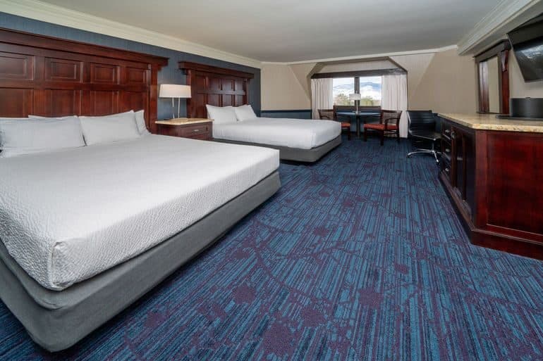 Deluxe Queen Room at Carson Valley Inn with two queen beds and contemporary decor