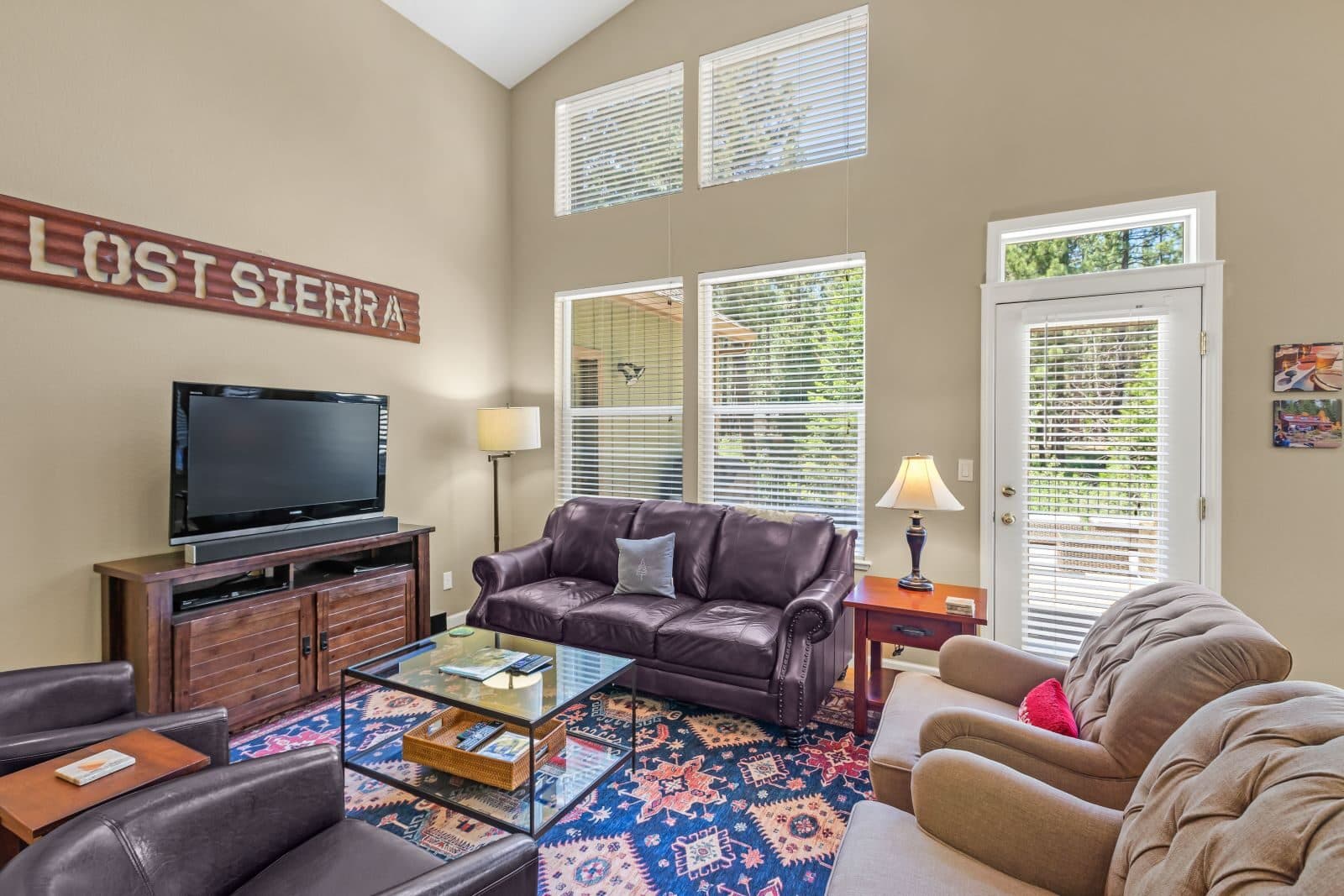 Spacious living room with high ceilings at Plumas Pines vacation townhome Graeagle CA