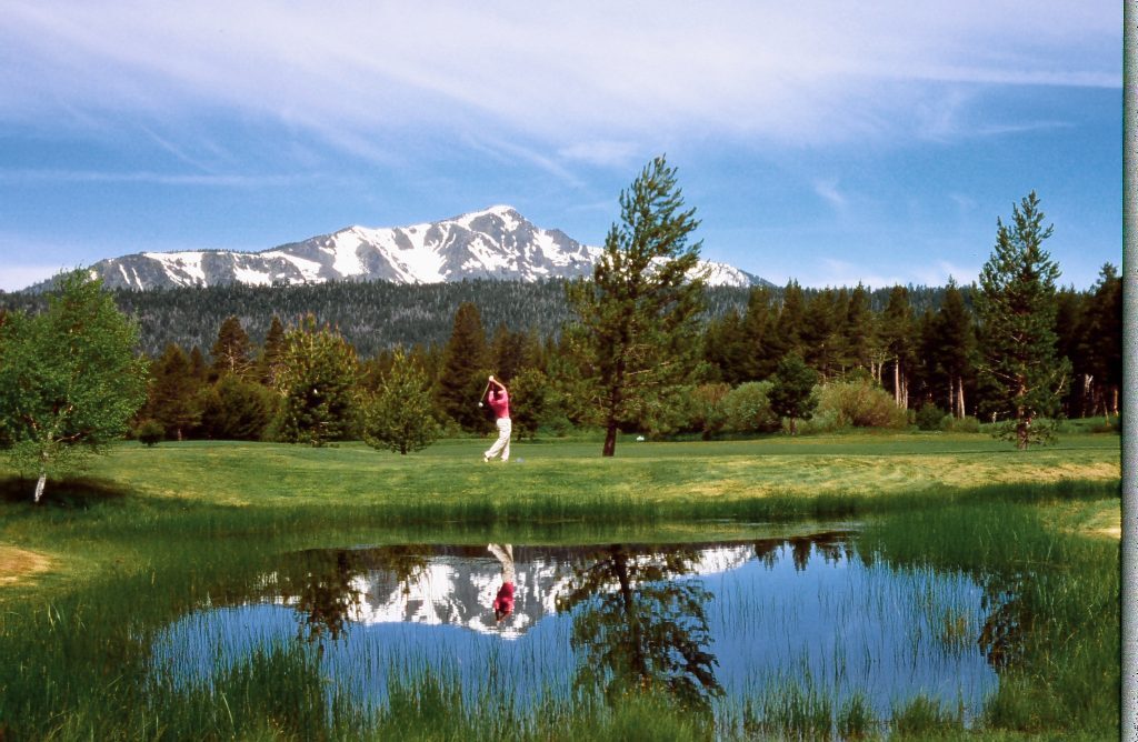 Evening view of green by pond at Lake Tahoe Golf Course