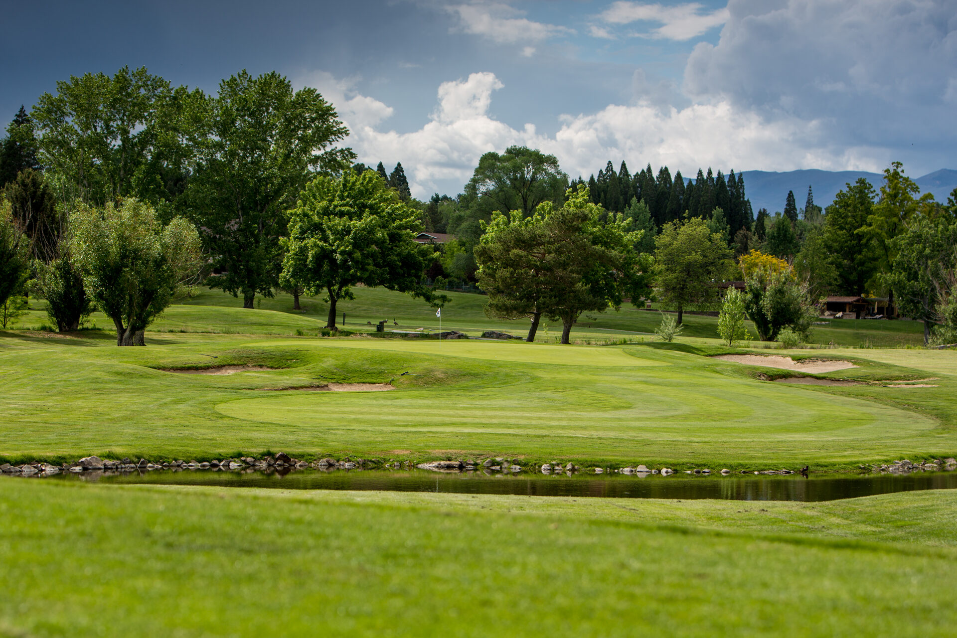 LakeRidge Golf Course 6th green panorama with Sierra Nevada mountain backdrop LakeRidge Golf Course 6th green panorama with Sierra Nevada mountain backdrop