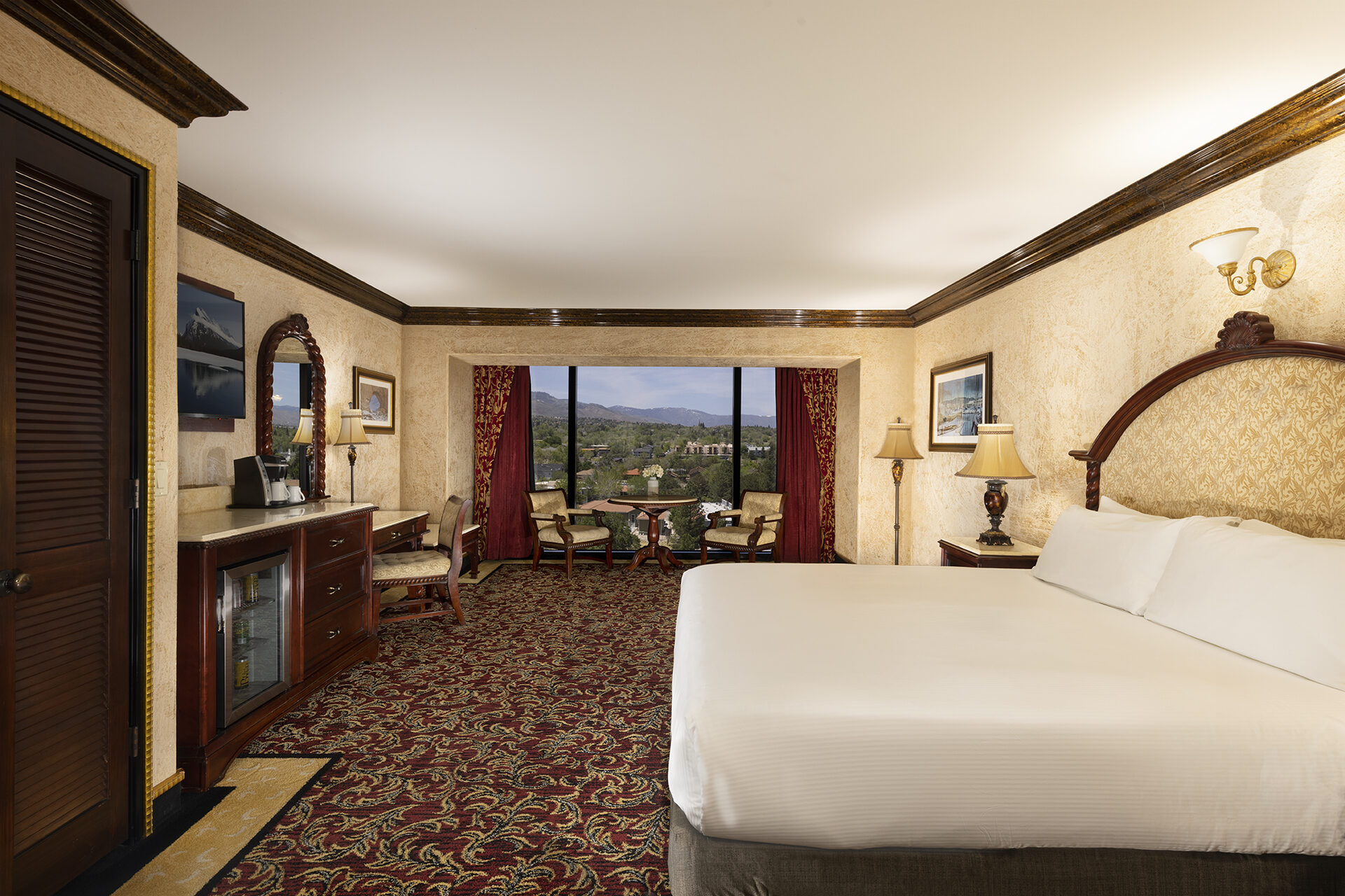 Tuscany Tower King Suite — elegantly appointed guest room with Italian-inspired decor and mountain view